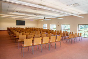 Interior image of the TCC 350/351/352 meeting room with TV monitor